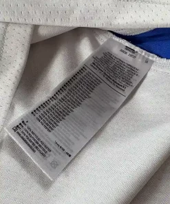 Étiquettes d'origine et instruction de lavage Maillot NBA Amar’e Stoudemire Phœnix Suns 2002-2006