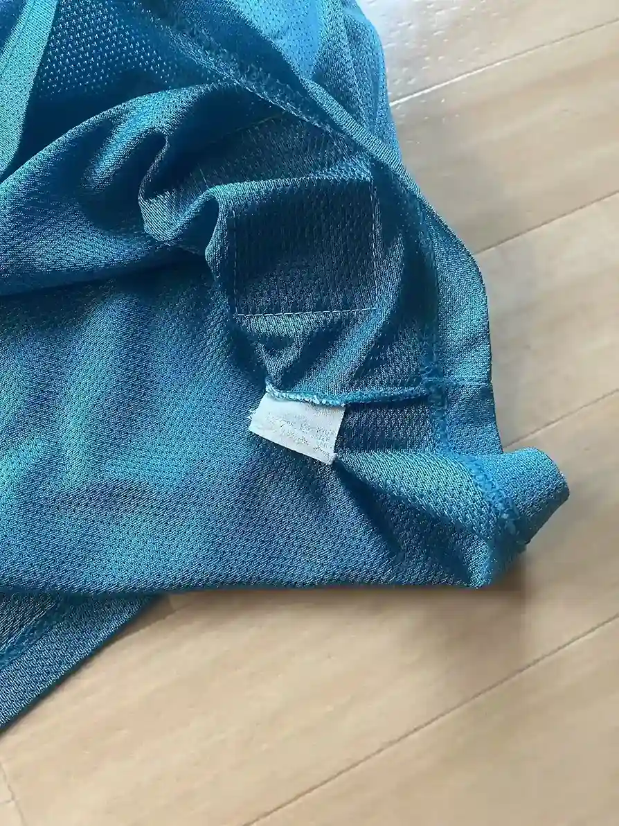 Étiquettes d'origine et instruction de lavage Maillot NBA Larry Johnson Charlotte Hornets 1991-1995