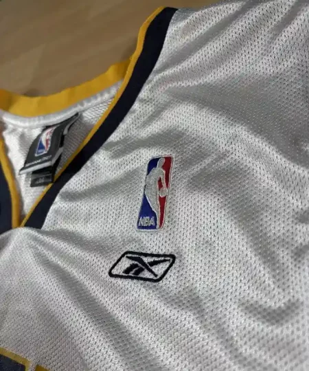 Logos brodés et détails marque Maillot NBA Jermaine O’Neal Indiana Pacers 2005-2006